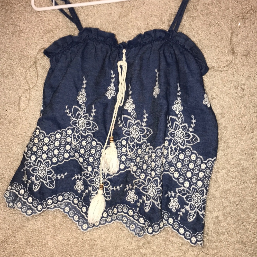 Denim top with white emboidery